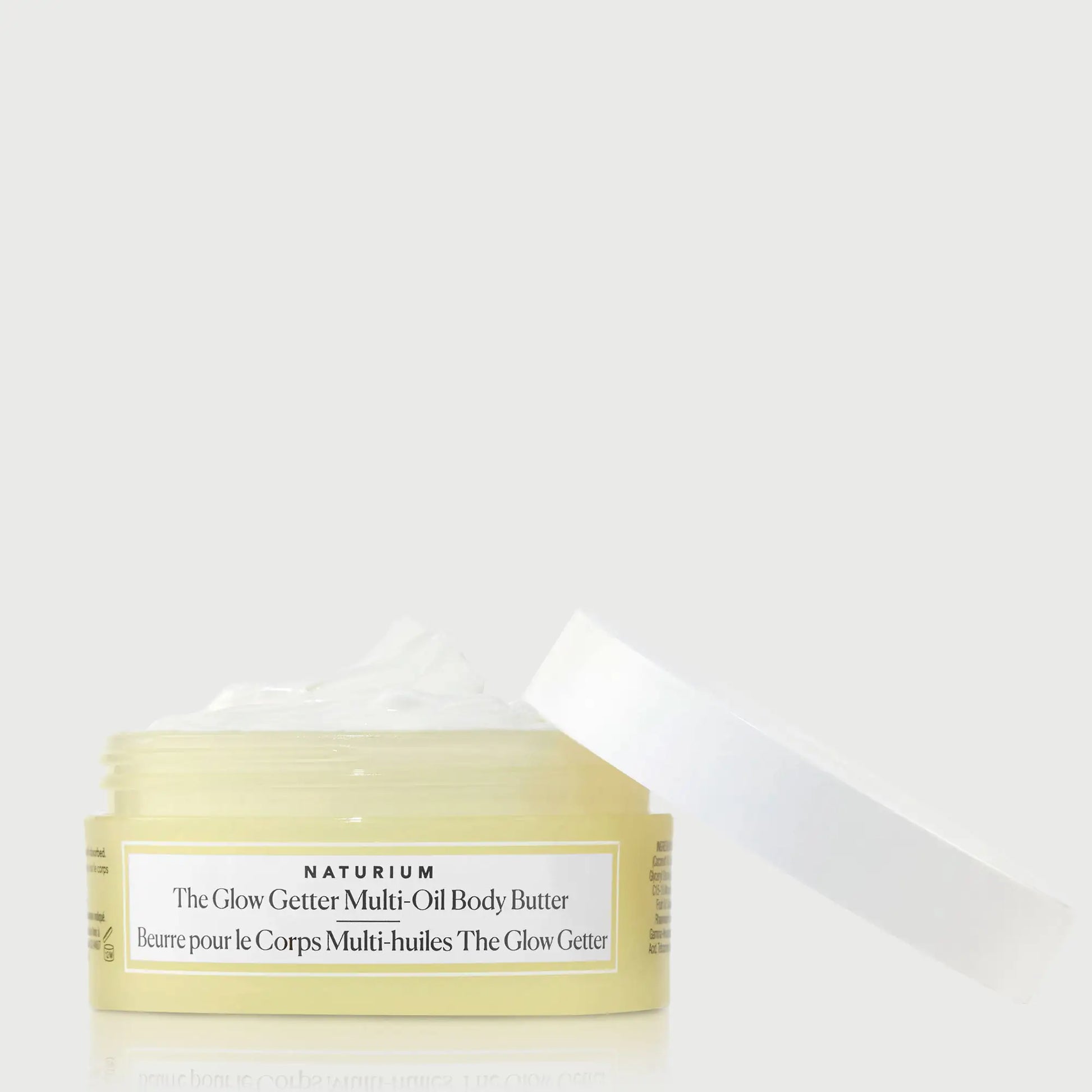 the-glow-getter-multi-oil-body-butter-travel-size-e9 NATR-40115_Glow-Getter-Body-Butter-Mini_front_capoff_bonebkgd.webp